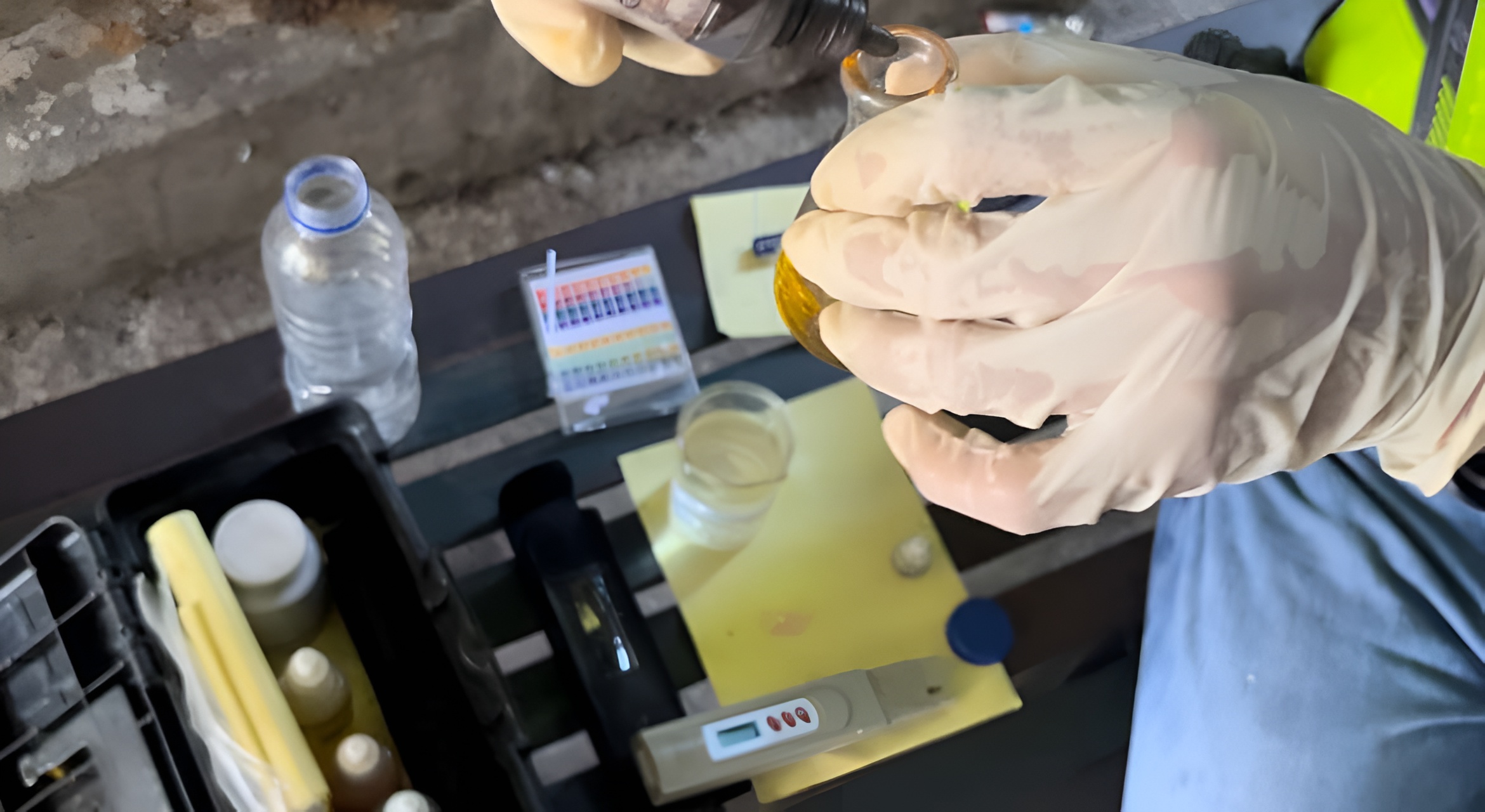 Technician performing onsite water treatment system analysis